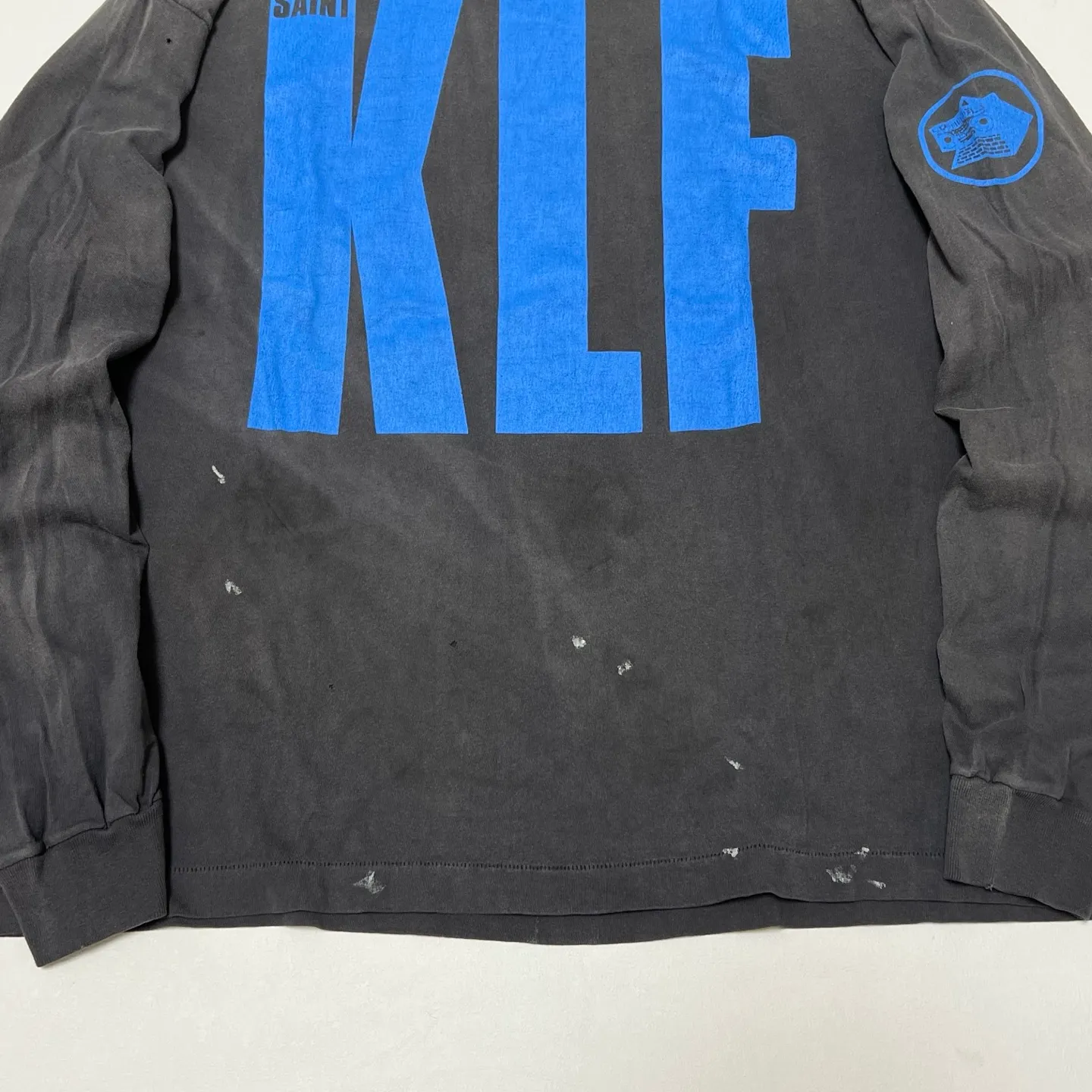 SAINT Mxxxxxx × The KLF BLUE KLF_LS TEE KLF/BLK Blue KLF tape recorder long sleeves Wash black S-XL Completely aligned Tube weaving without side seam fabric Garment dyeing Maliu water fading and distressing Simulated sun washing and fading treatment Natural and perfect fading Hand-made holes and frayed Ink splashing treatment Extremely heavy work Correct main mark/wash mark/little angel anti-counterfeiting mark